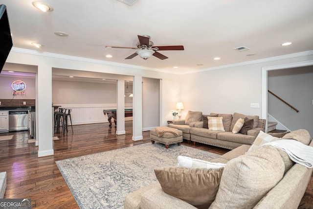395 Grove Ridge Dr, Loganville, GA 30052 - living area featuring dark wood-style flooring, a ceiling fan, stairway, crown molding, and recessed lighting