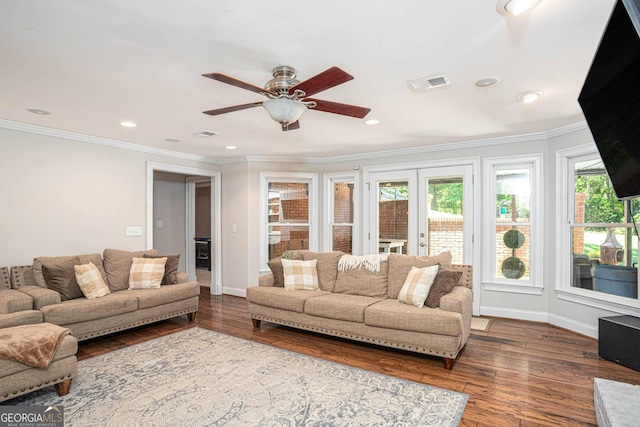 395 Grove Ridge Dr, Loganville, GA 30052 - living area with ceiling fan, crown molding, baseboards, dark wood finished floors, and recessed lighting