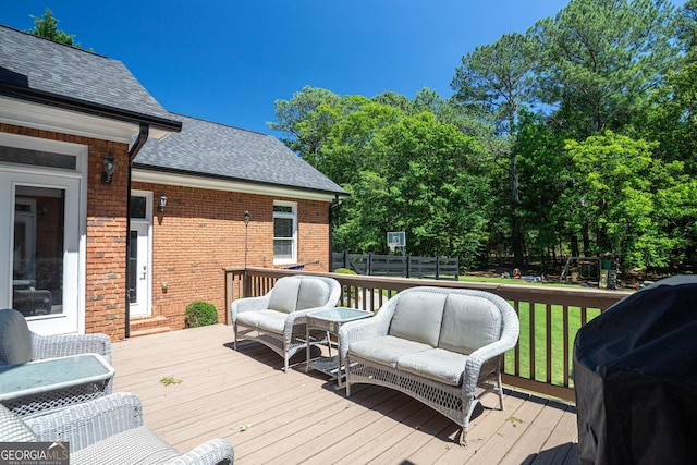 395 Grove Ridge Dr, Loganville, GA 30052 - wooden terrace with grilling area and an outdoor living space