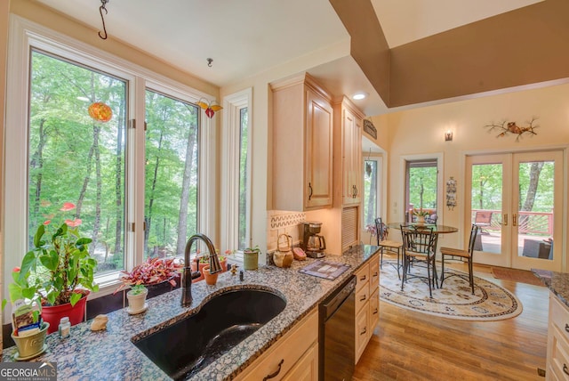 1289 Rainwater Trl, Tiger, GA 30576 - kitchen with black dishwasher, a sink, french doors, and light brown cabinets