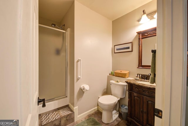 1289 Rainwater Trl, Tiger, GA 30576 - full bathroom with a stall shower, vanity, toilet, and baseboards