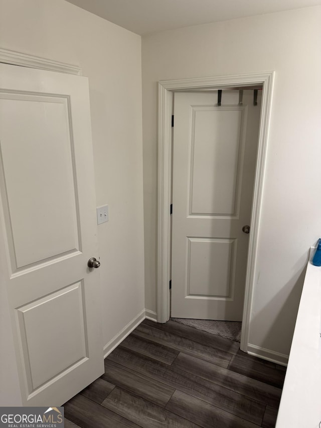 536 Magnolia Cir Unit 116, Palmetto, GA 30268 - corridor with dark wood finished floors and baseboards