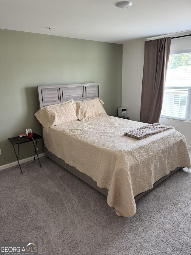 536 Magnolia Cir Unit 116, Palmetto, GA 30268 - carpeted bedroom with baseboards