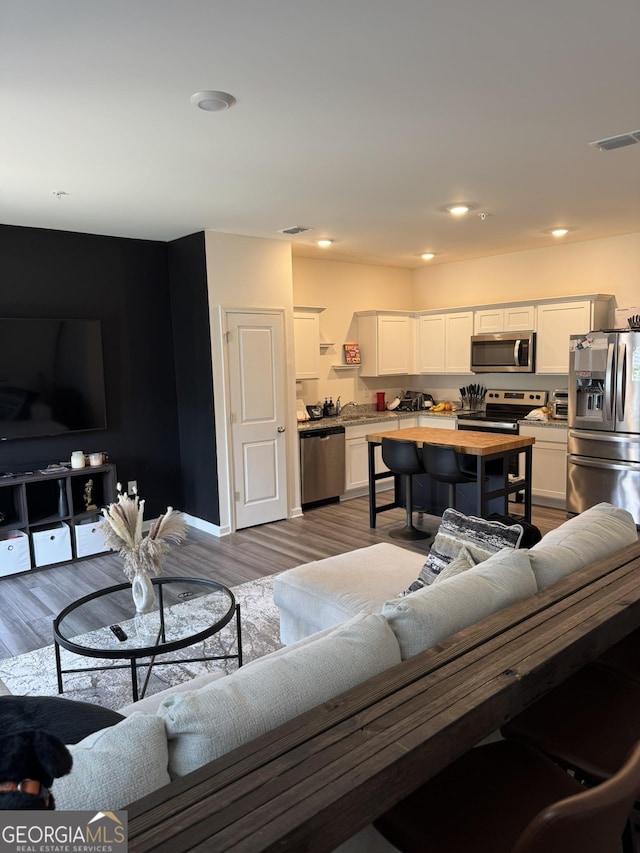 536 Magnolia Cir Unit 116, Palmetto, GA 30268 - living room featuring wood finished floors
