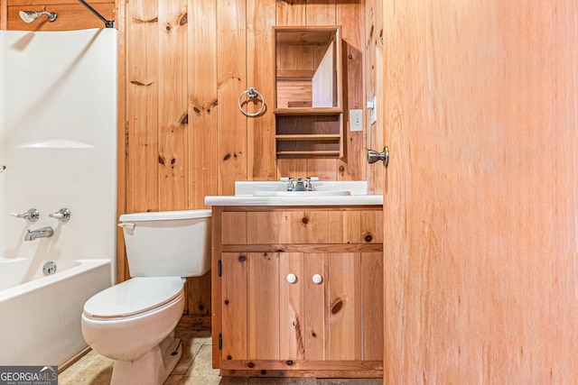 74 Charity Ln, Clayton, GA 30525 - full bathroom with vanity,  shower combination, toilet, and wood walls
