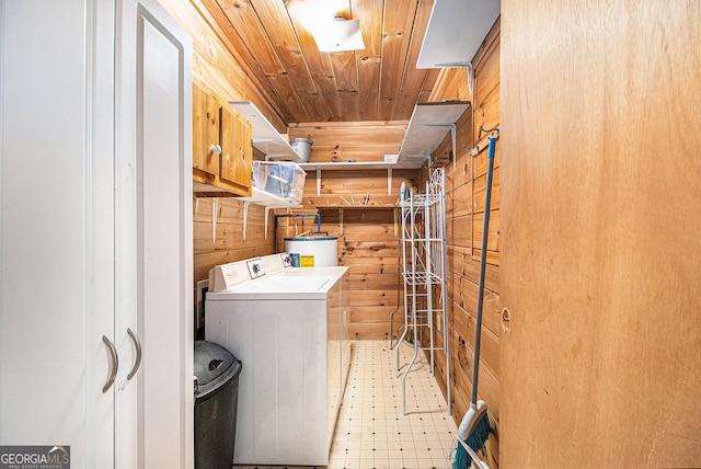74 Charity Ln, Clayton, GA 30525 - washroom featuring washer / dryer, wooden walls, wooden ceiling, light floors, and water heater