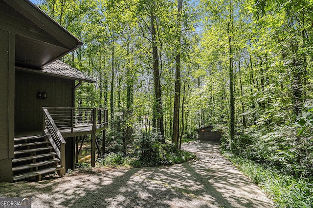 74 Charity Ln, Clayton, GA 30525 - view of yard with an outdoor structure, a wooden deck, and stairway