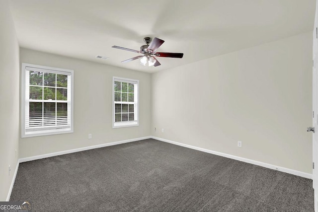 6341 Stewart Ridge Walk, Buford, GA 30518 - empty room with a ceiling fan, dark colored carpet, and baseboards
