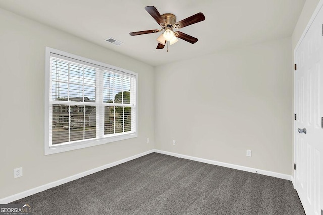 6341 Stewart Ridge Walk, Buford, GA 30518 - empty room with a ceiling fan, baseboards, and dark colored carpet