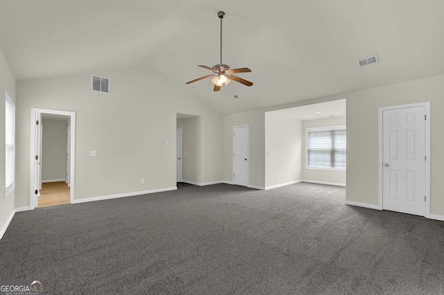 6341 Stewart Ridge Walk, Buford, GA 30518 - unfurnished living room with dark colored carpet, a ceiling fan, lofted ceiling, and baseboards