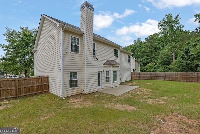 6341 Stewart Ridge Walk, Buford, GA 30518 - rear view of property with a chimney and a patio
