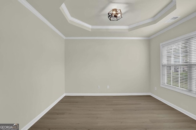 6341 Stewart Ridge Walk, Buford, GA 30518 - spare room with a tray ceiling, crown molding, wood finished floors, a chandelier, and baseboards