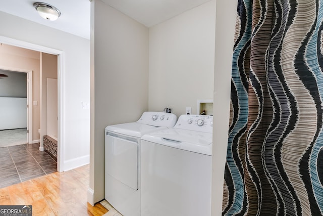 103 Depot St, Buchanan, GA 30113 - washroom featuring washing machine and clothes dryer and baseboards