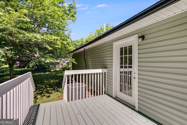 103 Depot St, Buchanan, GA 30113 - wooden deck featuring a lawn