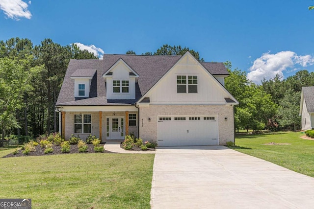 4075 O Henry Ct, Mcdonough, GA 30252 - view of front facade featuring concrete driveway, a front lawn, french doors, and brick siding