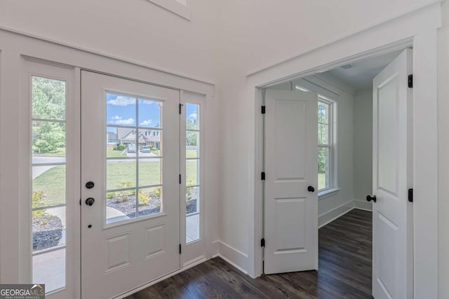 4075 O Henry Ct, Mcdonough, GA 30252 - foyer entrance with dark wood-style floors and baseboards