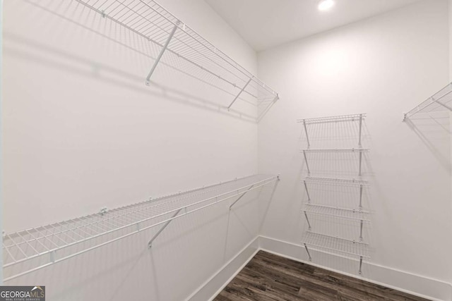 4075 O Henry Ct, Mcdonough, GA 30252 - spacious closet featuring dark wood-style floors