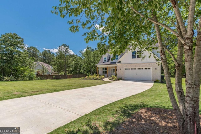 4075 O Henry Ct, Mcdonough, GA 30252 - view of front facade featuring concrete driveway, brick siding, and board and batten siding
