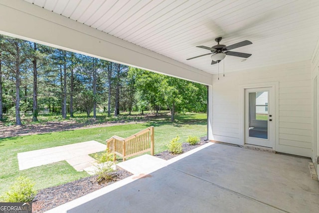 4075 O Henry Ct, Mcdonough, GA 30252 - view of patio featuring ceiling fan and view of wooded area