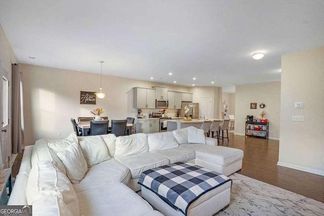 105 Paulowina Cir, Mcdonough, GA 30253 - living room with wood finished floors, baseboards, and recessed lighting