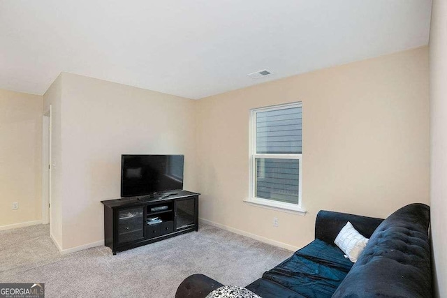 105 Paulowina Cir, Mcdonough, GA 30253 - carpeted living area with baseboards