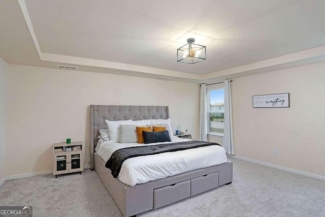 105 Paulowina Cir, Mcdonough, GA 30253 - bedroom featuring a raised ceiling, carpet floors, and baseboards