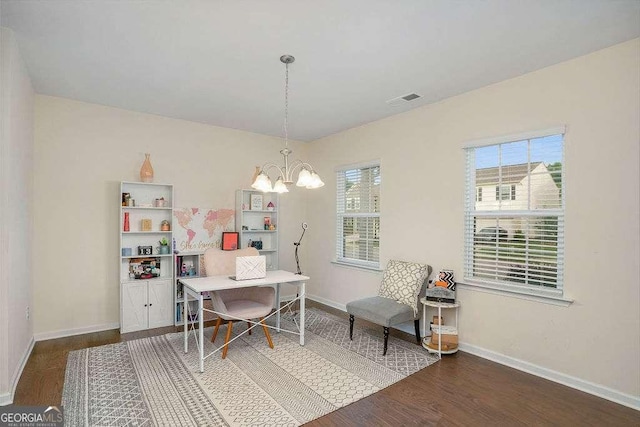 105 Paulowina Cir, Mcdonough, GA 30253 - home office with wood finished floors, a chandelier, and baseboards