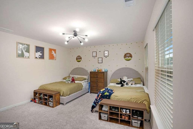 105 Paulowina Cir, Mcdonough, GA 30253 - bedroom with a chandelier, carpet flooring, and baseboards