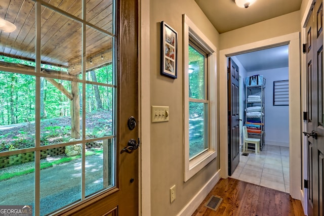 177 Whitetail Trl, Clayton, GA 30525 - doorway with baseboards, dark wood-type flooring, and wooden ceiling