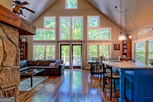 177 Whitetail Trl, Clayton, GA 30525 - living room featuring high vaulted ceiling, plenty of natural light, dark wood-type flooring, and a ceiling fan