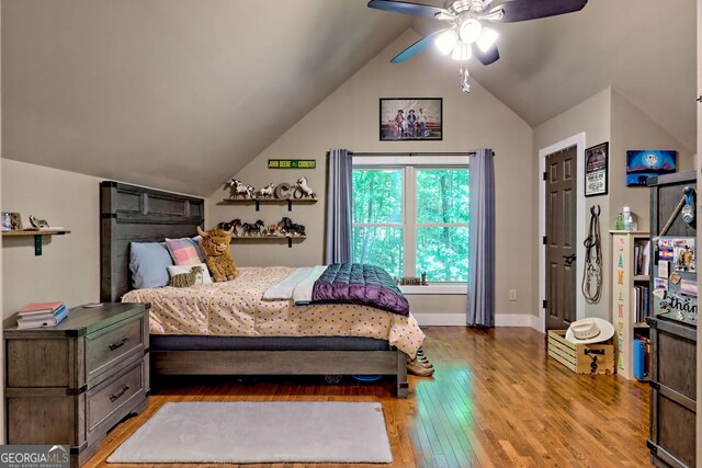 177 Whitetail Trl, Clayton, GA 30525 - bedroom with light wood-type flooring, lofted ceiling, baseboards, and ceiling fan