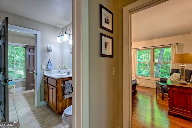 177 Whitetail Trl, Clayton, GA 30525 - bathroom with vanity, healthy amount of natural light, baseboards, and toilet