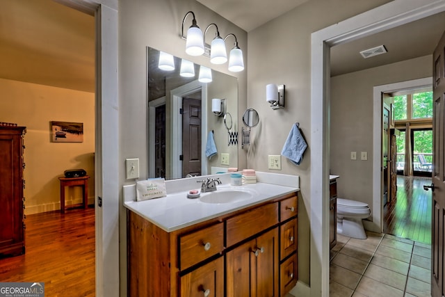 177 Whitetail Trl, Clayton, GA 30525 - bathroom featuring vanity, toilet, tile patterned floors, and baseboards