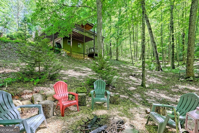 177 Whitetail Trl, Clayton, GA 30525 - view of yard with a deck and a wooded view