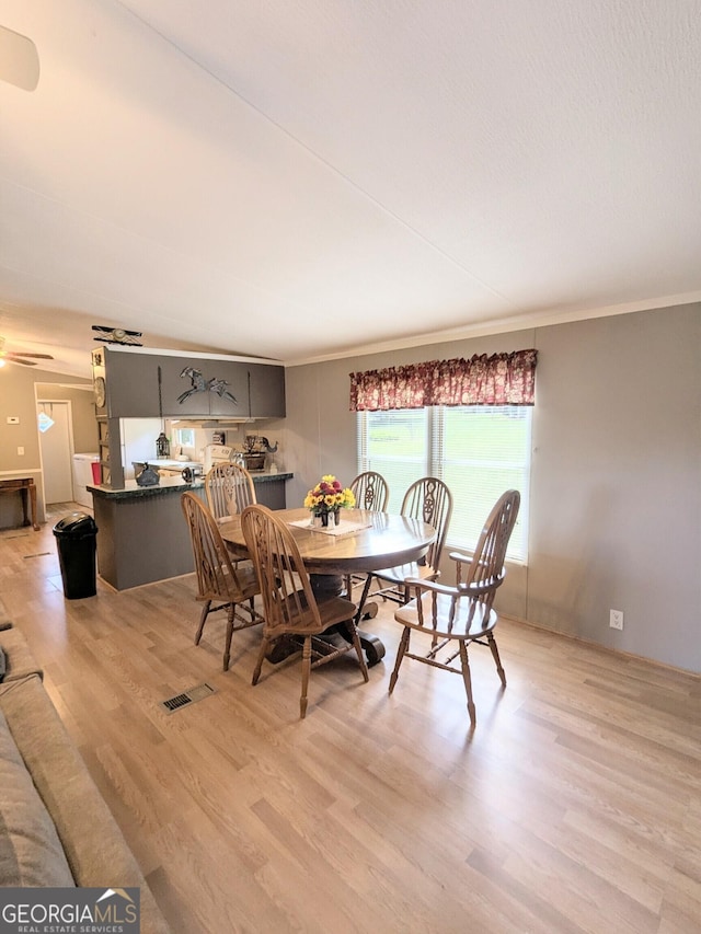 1096 Tesnatee Gap Valley Rd, Cleveland, GA 30528 - dining area featuring light wood-style floors and ornamental molding