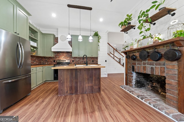 7170 Church St, Bartow, GA 30413 - kitchen featuring green cabinets, stainless steel appliances, premium range hood, open shelves, and recessed lighting
