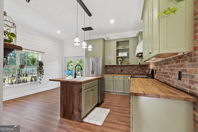 7170 Church St, Bartow, GA 30413 - kitchen with wood counters, a sink, appliances with stainless steel finishes, open shelves, and green cabinetry