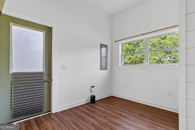 7170 Church St, Bartow, GA 30413 - empty room with electric panel, wood finished floors, and baseboards