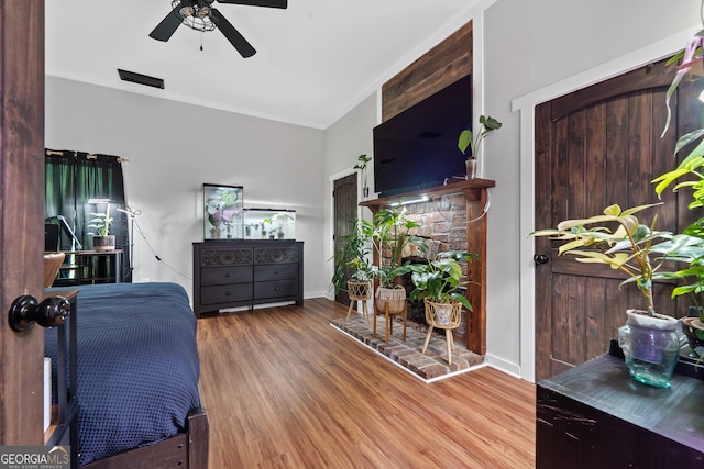7170 Church St, Bartow, GA 30413 - bedroom with wood finished floors, ceiling fan, and baseboards