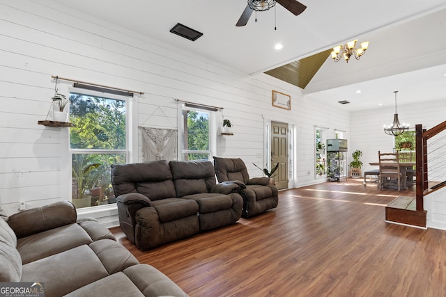 7170 Church St, Bartow, GA 30413 - living room with a chandelier, wood finished floors, ceiling fan, recessed lighting, and wooden walls