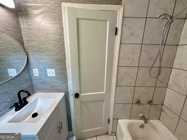 1681 Stanton Rd SW, Atlanta, GA 30311 - full bathroom with vanity, tile walls, and shower / bath combination