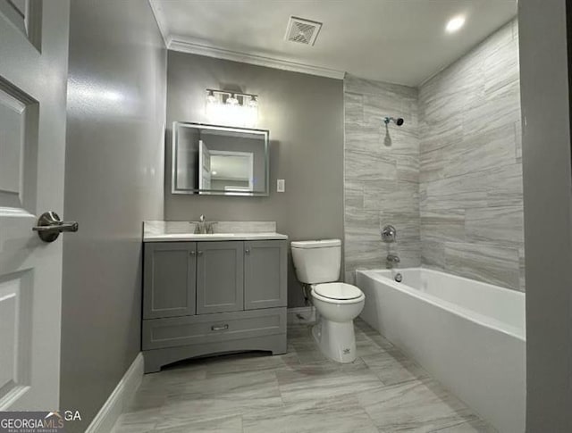 5711 Sterling Pl, Macon, GA 31206 - full bath featuring toilet, vanity, bathing tub / shower combination, baseboards, and ornamental molding
