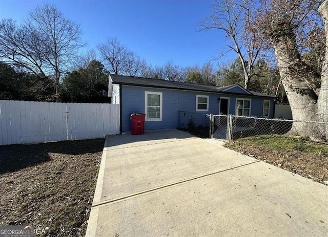 5711 Sterling Pl, Macon, GA 31206 - view of front of house featuring concrete driveway and a gate