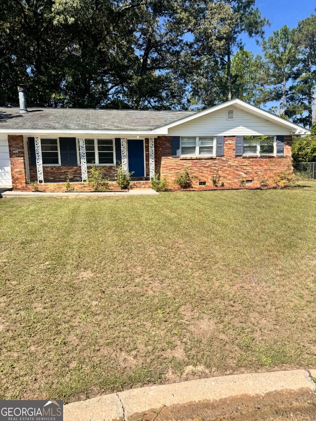 206 Audubon Way, Warner Robins, GA 31088 - ranch-style house featuring a front yard and brick siding