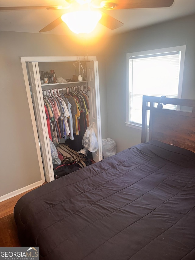 206 Audubon Way, Warner Robins, GA 31088 - bedroom featuring a closet, wood finished floors, and ceiling fan