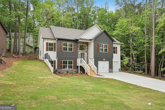 2279 Lakeview Pkwy, Villa Rica, GA 30180 - view of front of house with driveway, board and batten siding, an attached garage, and a front lawn