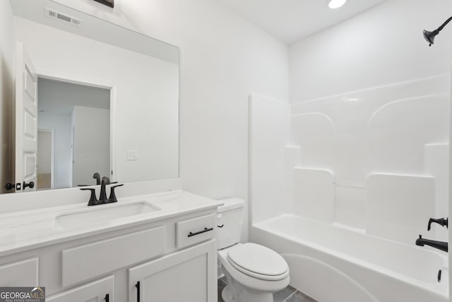 2279 Lakeview Pkwy, Villa Rica, GA 30180 - full bathroom with toilet, vanity, and  shower combination
