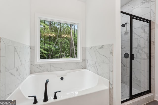 2279 Lakeview Pkwy, Villa Rica, GA 30180 - bathroom with a bath and a marble finish shower