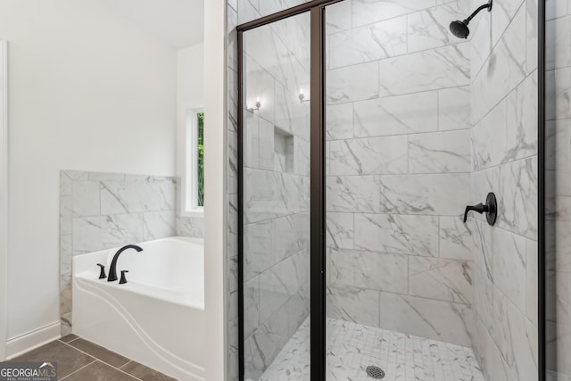2279 Lakeview Pkwy, Villa Rica, GA 30180 - bathroom with a bath, a stall shower, and tile patterned floors