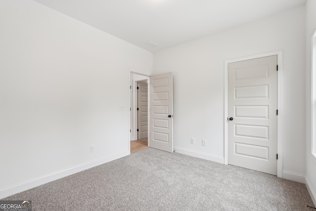 2279 Lakeview Pkwy, Villa Rica, GA 30180 - unfurnished bedroom featuring carpet and baseboards